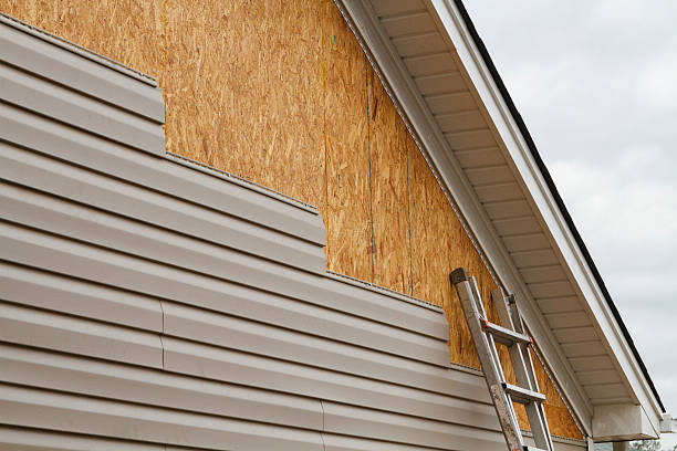Professional Emergency Siding Repair technician working in Trinity, TX